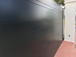 PUERTA CORREDERA CUARTERONES